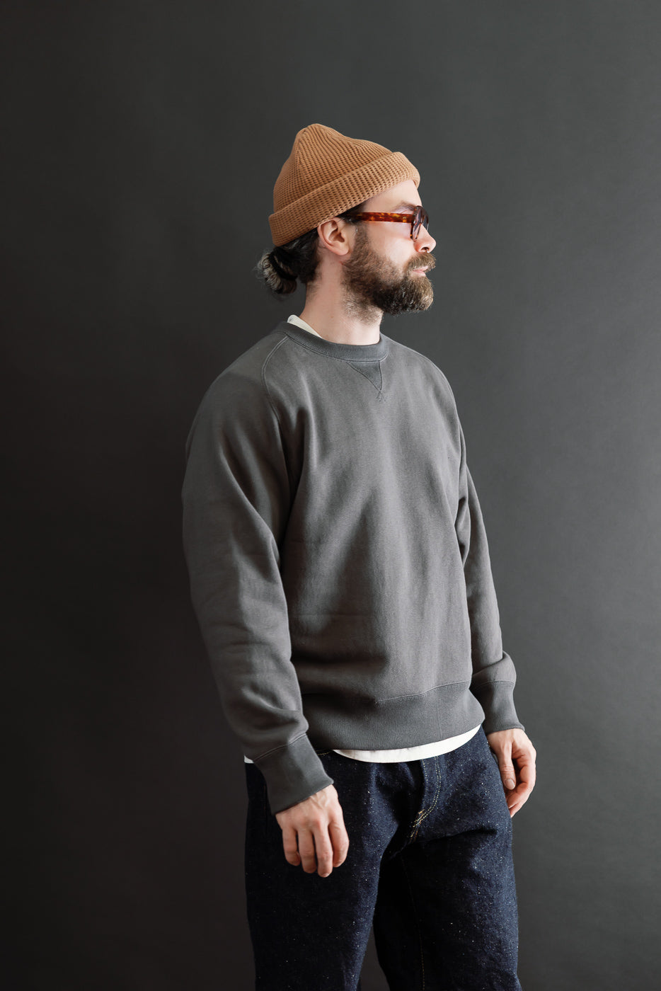 Full body side view of a male model (5'9