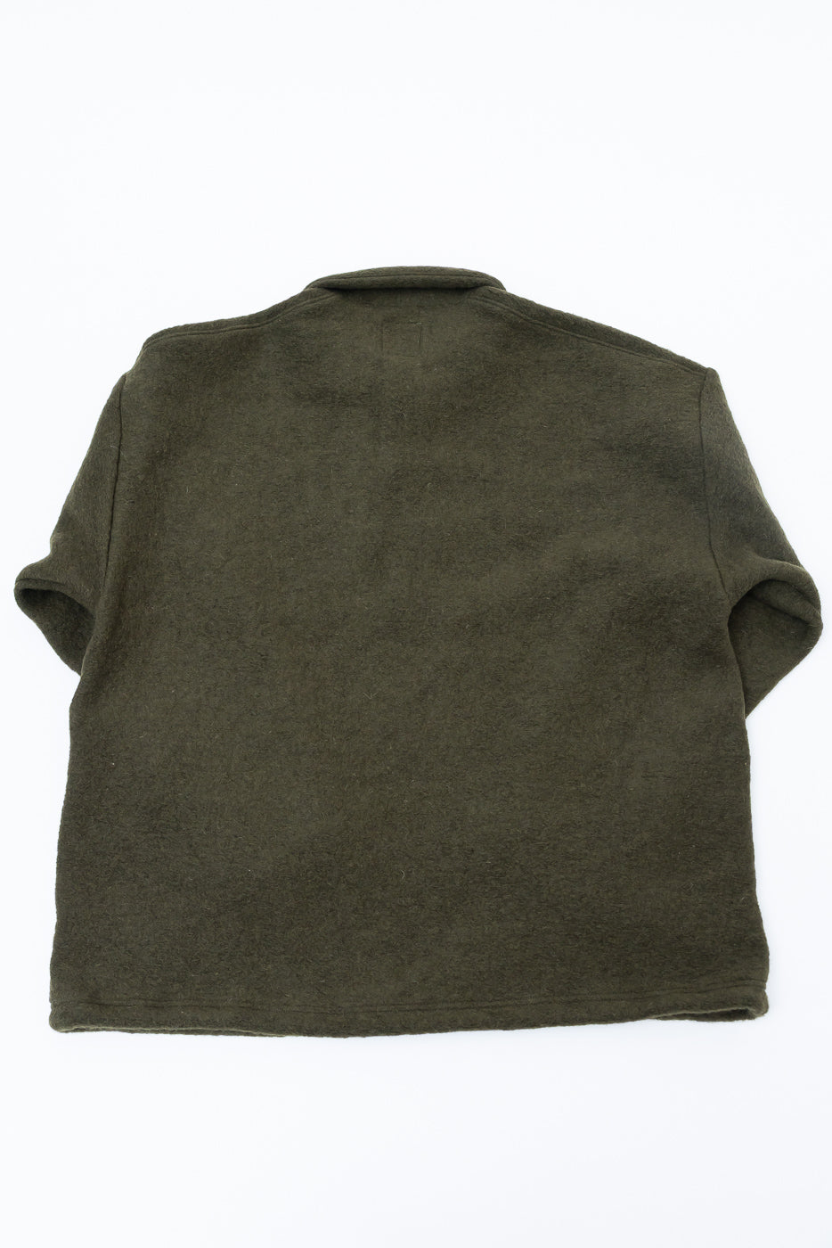 Flat lay of olive wool polo shirt, back view, showing collar and short sleeves.