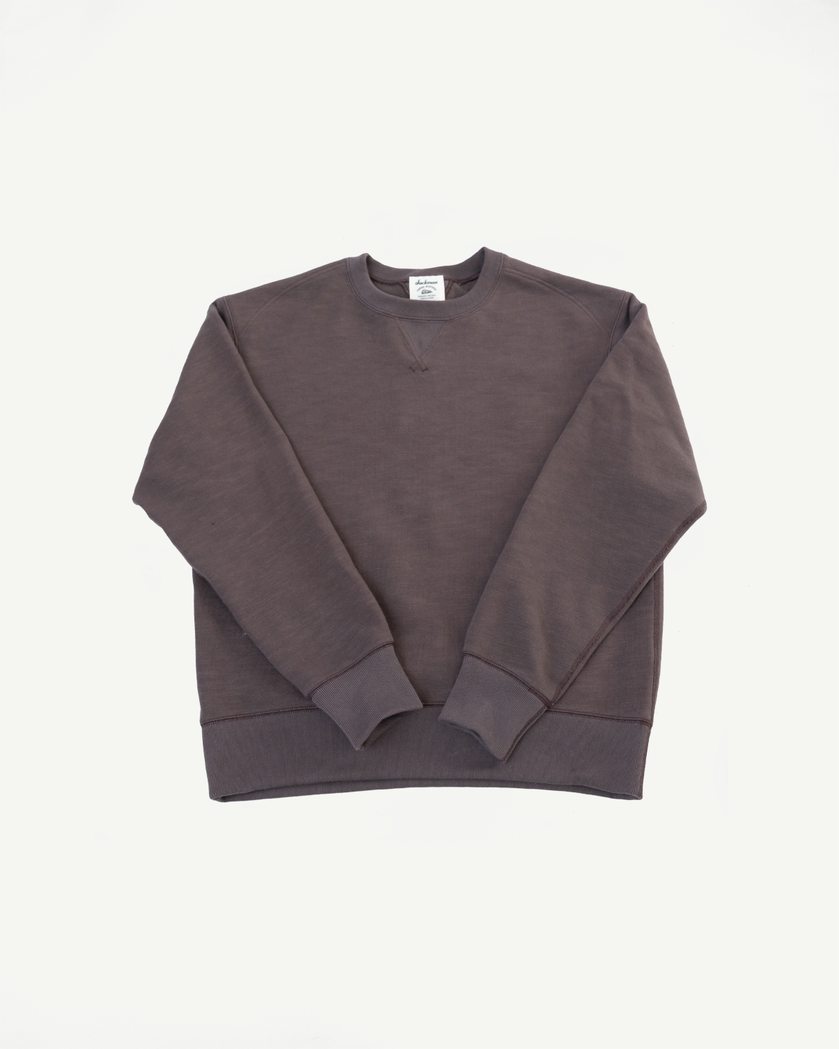 Front view flat lay of a charcoal grey crewneck sweatshirt with ribbed cuffs and hem.