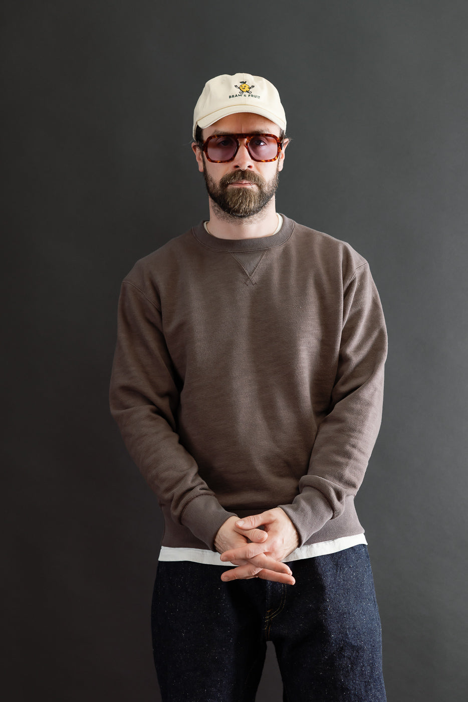 Full body front view of a male model, 5'9