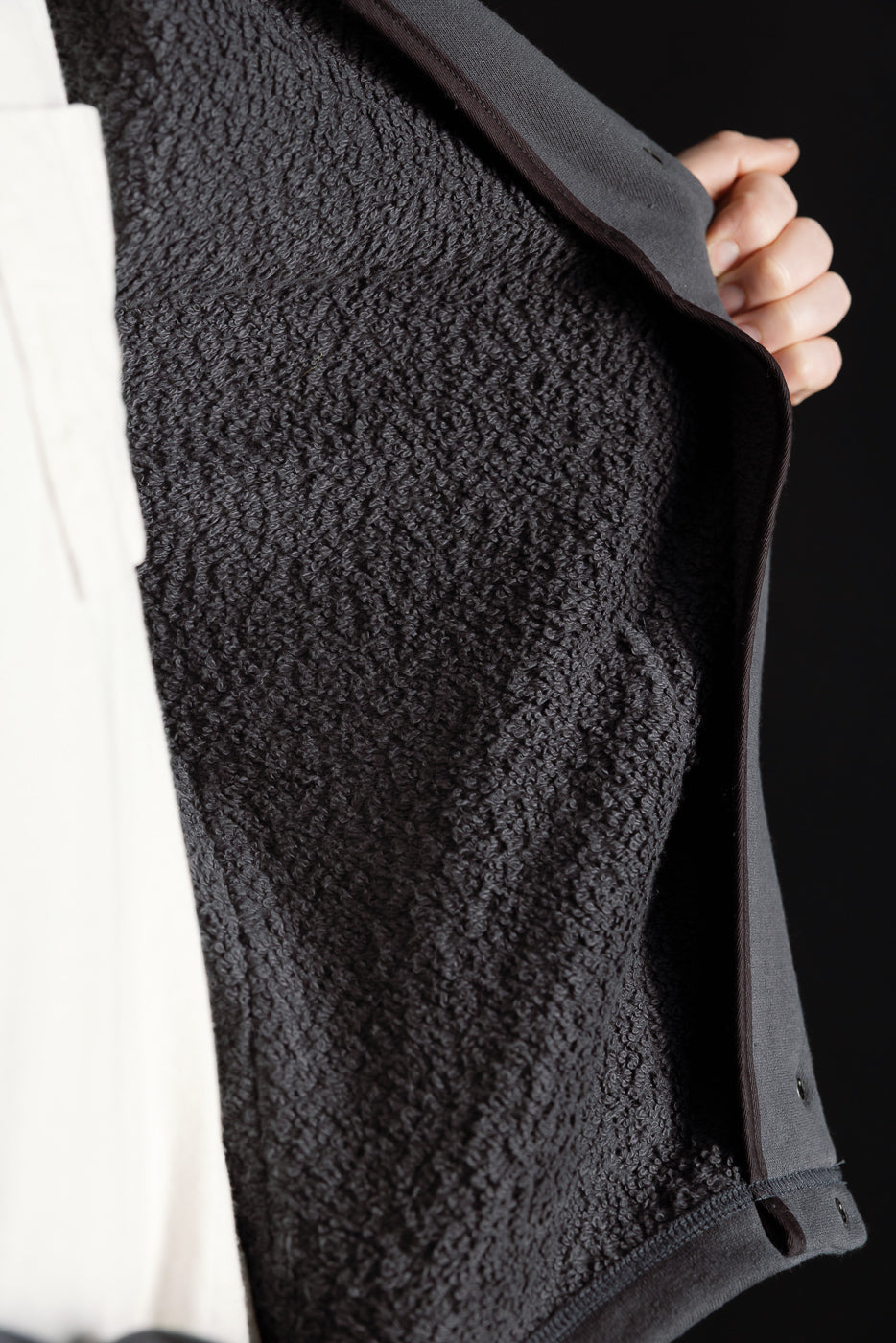 Close-up of Jackman JM8580 Big Loop Collarless Jacket, showing interior loop textured fabric.