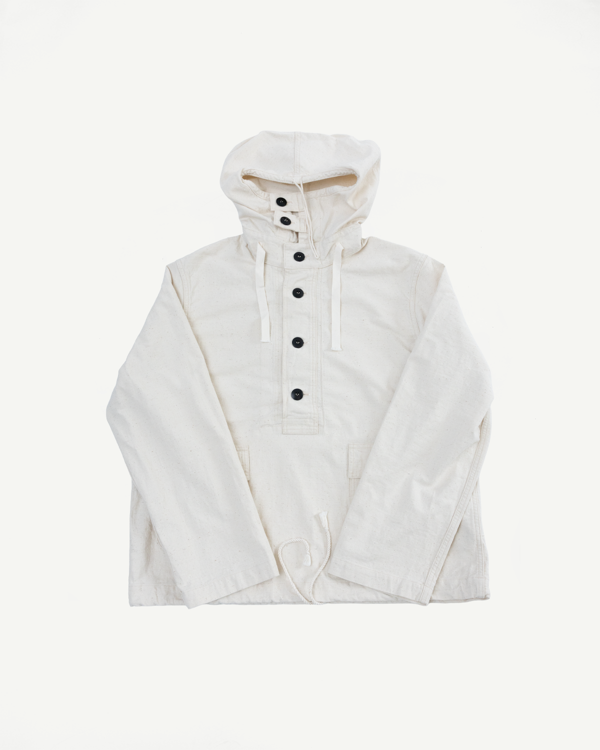 Flat lay front view of off-white sailor's pullover parka with hood, buttons, and drawstring hem.