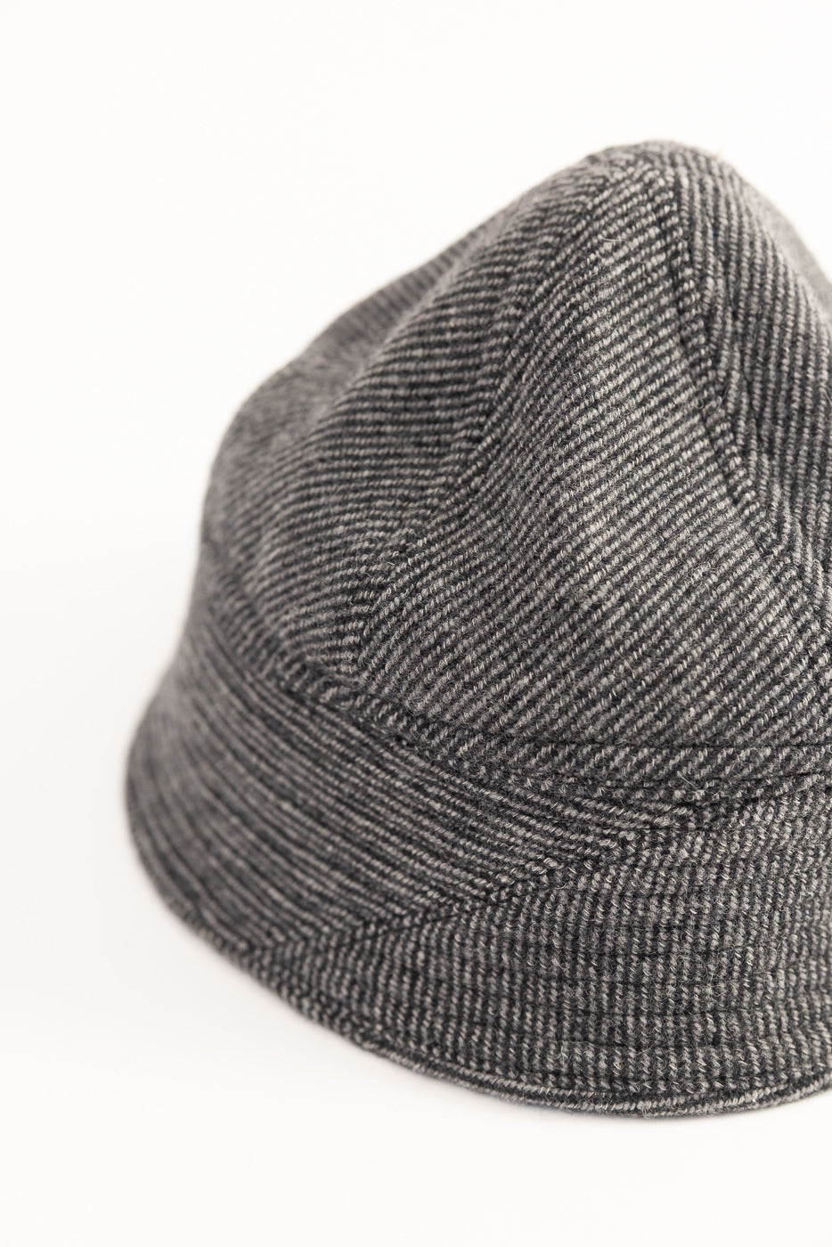 Close-up of John Gluckow Lot JG-31 Tweedy Prison Cap in gray, showing side panel and fabric texture