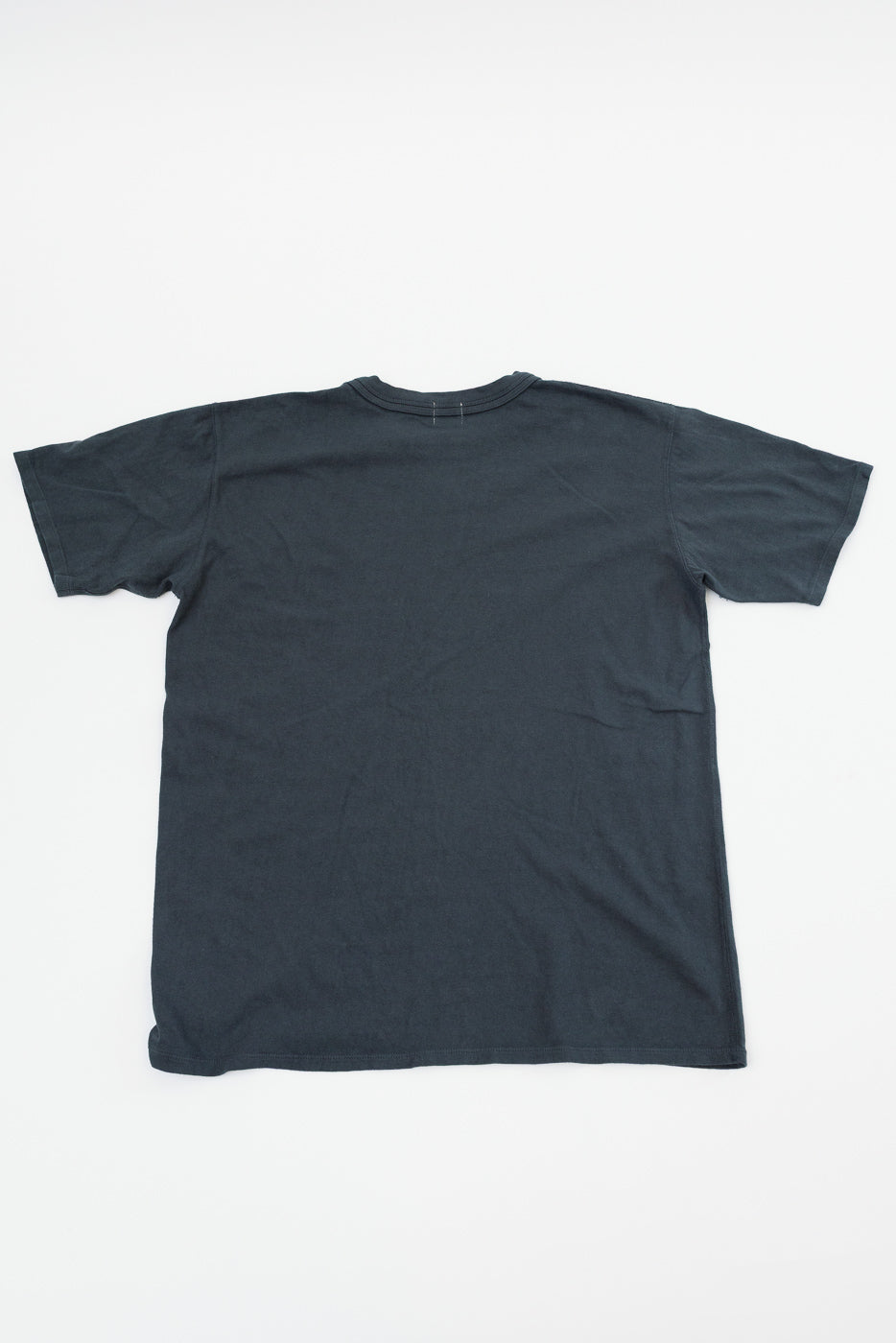Flat lay back view of dark gray short sleeve t-shirt, showing crew neck and hem details