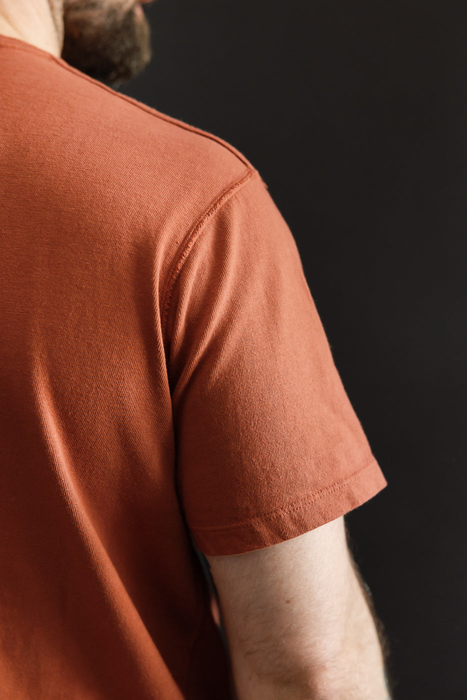 Close-up side view of male model, 5'9