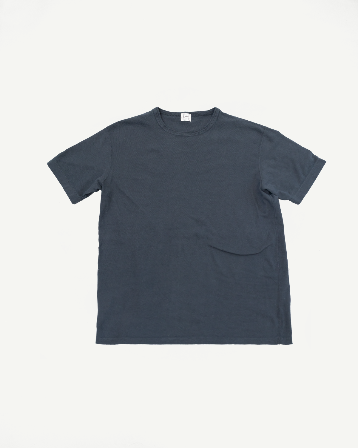 Front flat lay of dark gray short-sleeve t-shirt with chest pocket, ribbed crew neck, and visible tag