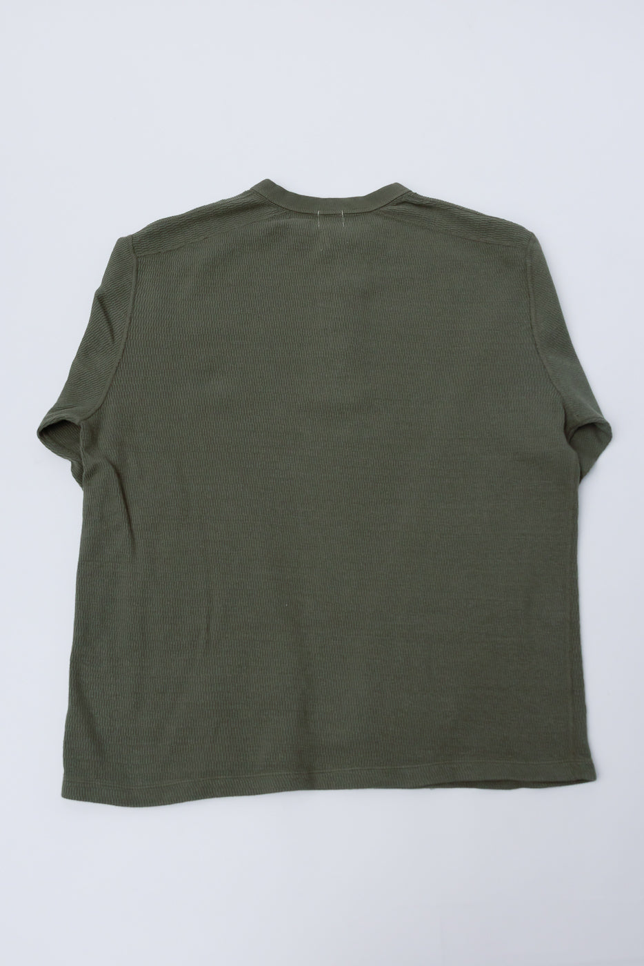 Flat lay back view of army olive Loop & Weft Supima honeycomb knit thermal shirt, showing fabric texture.