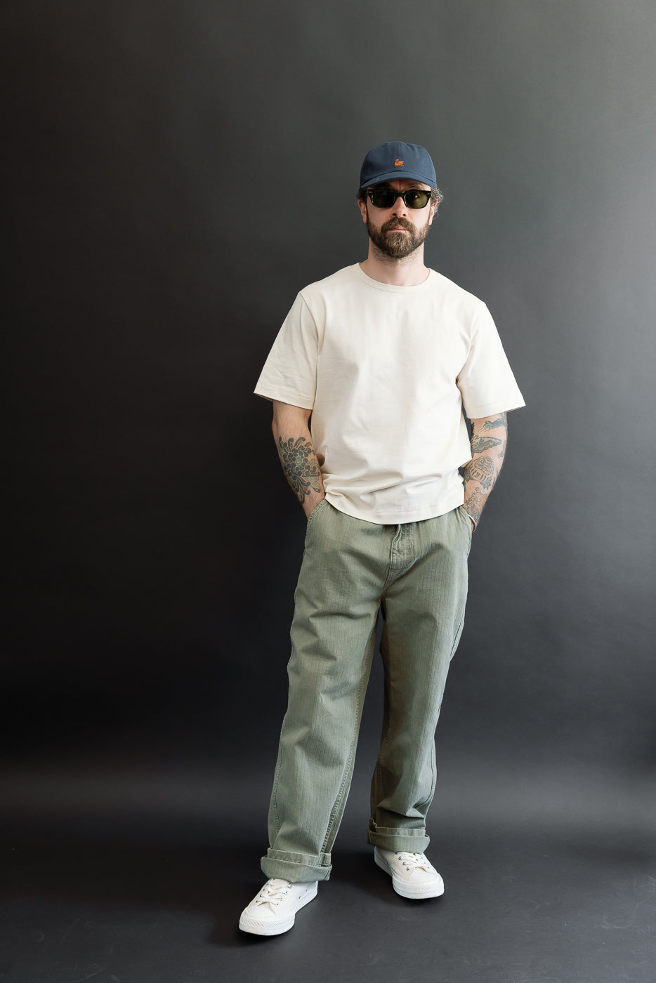 Full body front view of a male model, 5'9