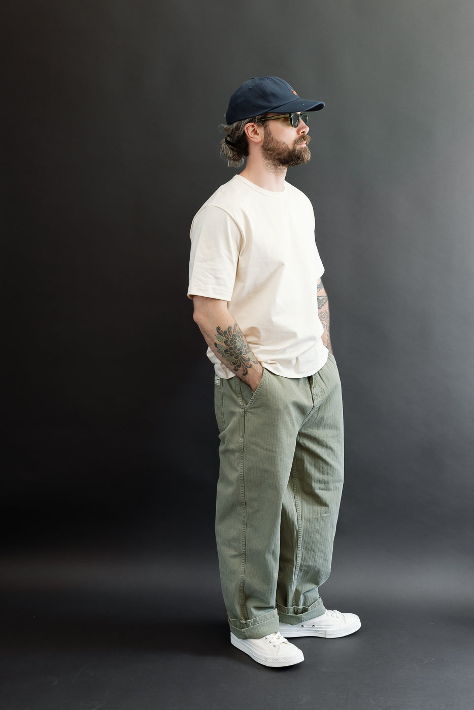 Full body side view of a male model (5'9