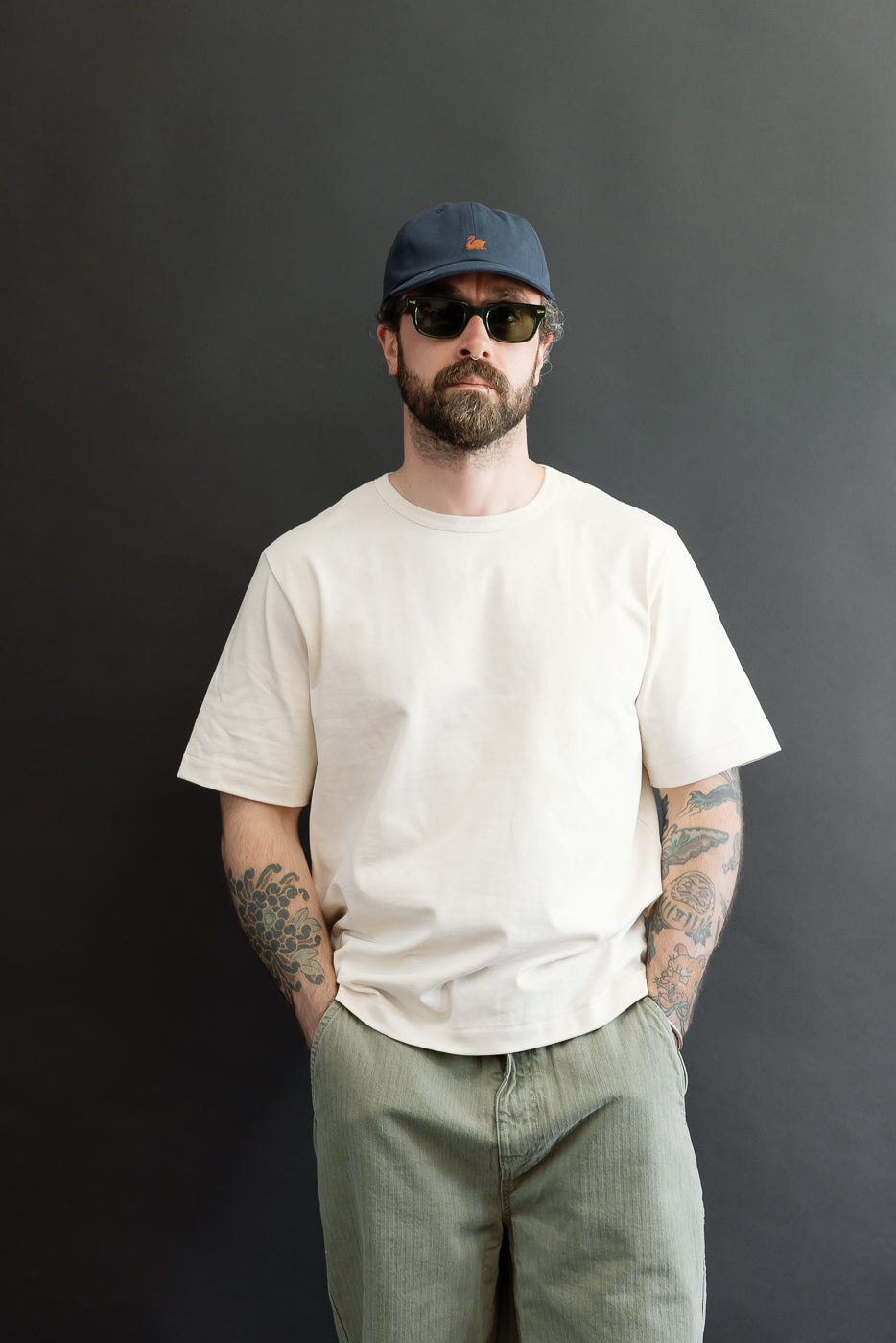 Full body front view of a male model, 5'9