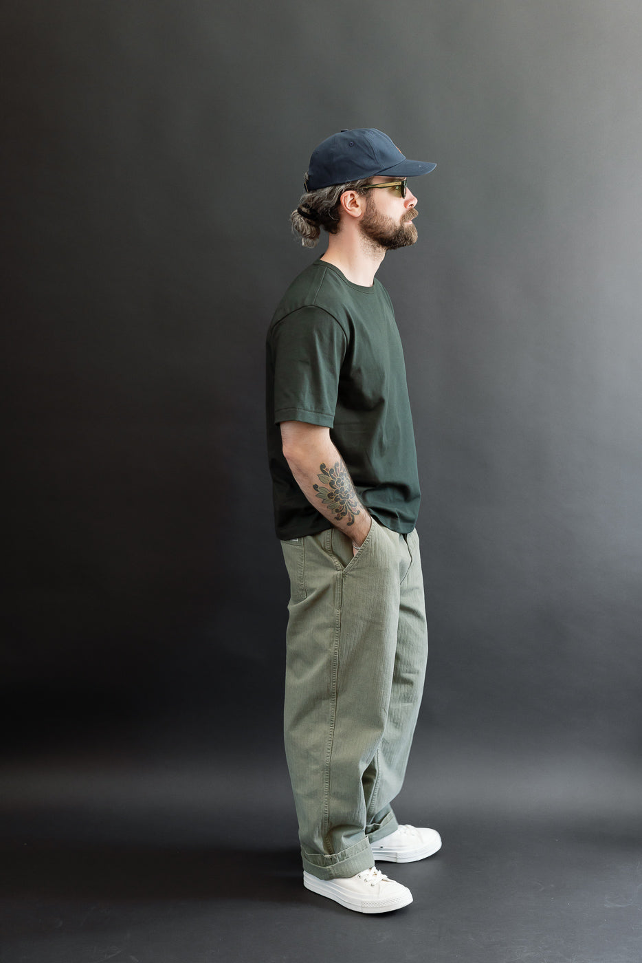 Full body side view of a male model, 5'9
