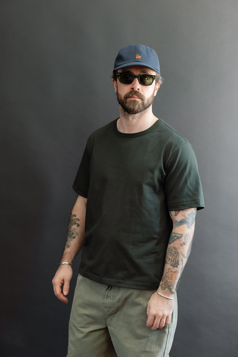 Full body front view of a male model, 5'9