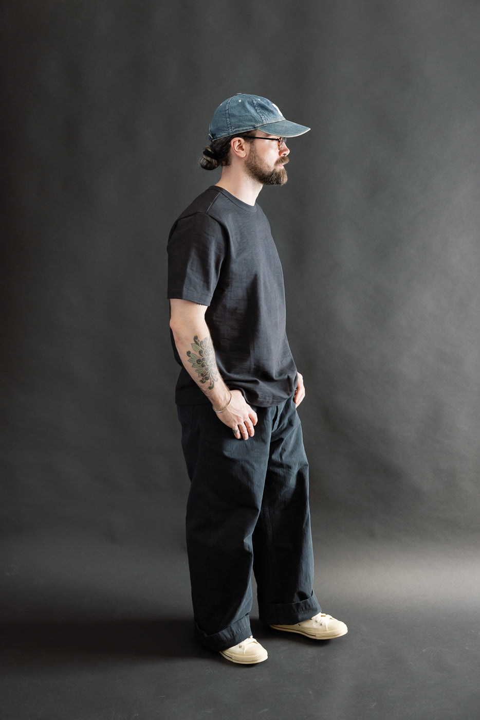 Full body side view of male model 5'9