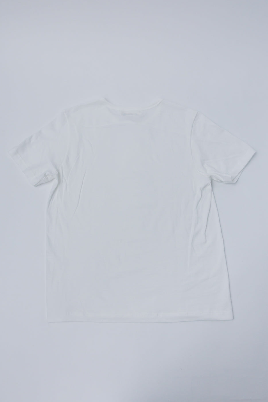 Flat lay of Merz B Schwanen white classic fit T-shirt, back view, short sleeves, crew neck