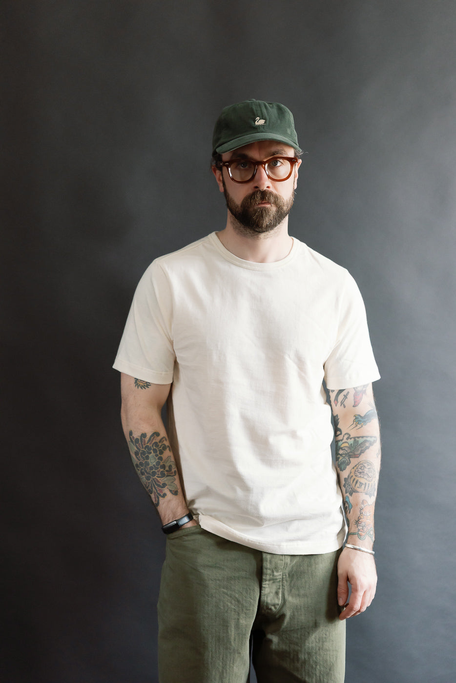 Male model 5'9, 165lbs, athletic build, wearing classic fit loopwheeled nature T-shirt, front full body view, Dant contemporary casual apparel