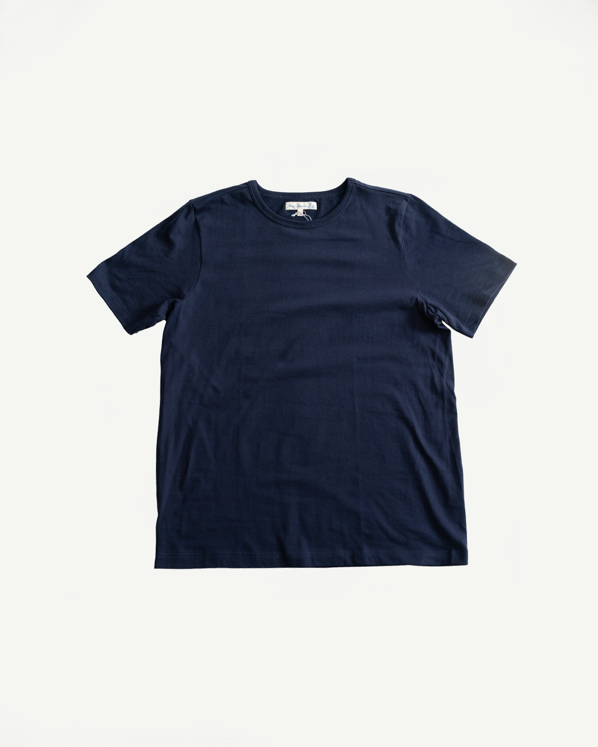 Flat lay of navy blue classic fit loopwheeled T-shirt, front view, short sleeves, crew neck.