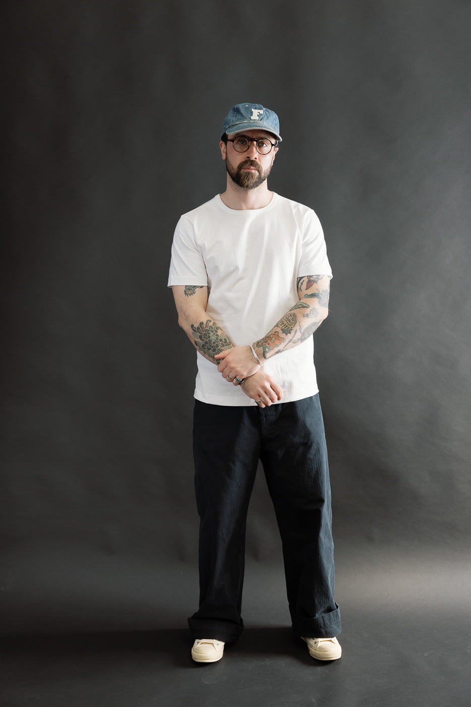 Front full body view of male model 5'9