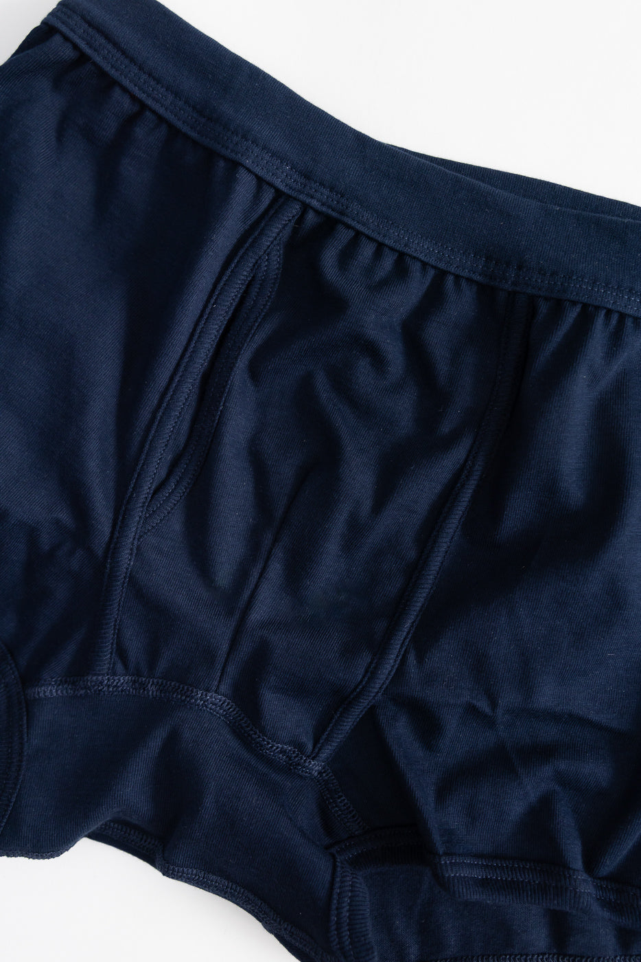 254.66 - Loopwheeled Boxer Brief - Ink Blue, featuring a smooth, elastic knit for comfort and durability, designed with a keyhole opening and elastic waistband, laid flat showcasing precise craftsmanship.