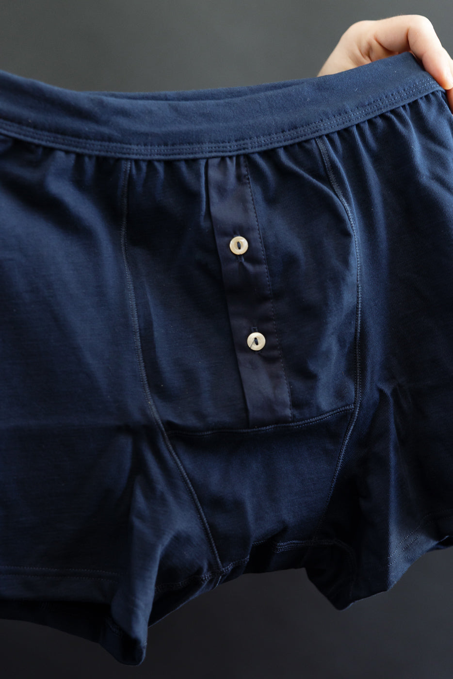 255.66 - Loopwheeled Boxer Button Fly - Ink Blue: Men’s navy-blue boxer shorts with an elastic waistband and two-button front fly, showcasing Merz's durable organic cotton and detailed stitching, embodying Dant's heritage-inspired menswear ethos.