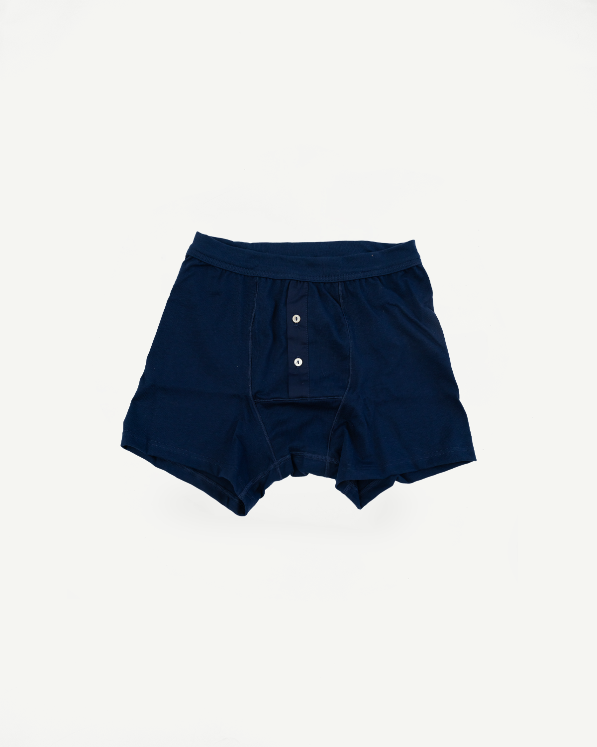 Loopwheeled Boxer Button Fly - Ink Blue: Navy-blue boxer-style underwear with an elastic waistband and two-button fly, crafted from organic cotton for a light, durable fit reflecting Dant's premium menswear ethos.