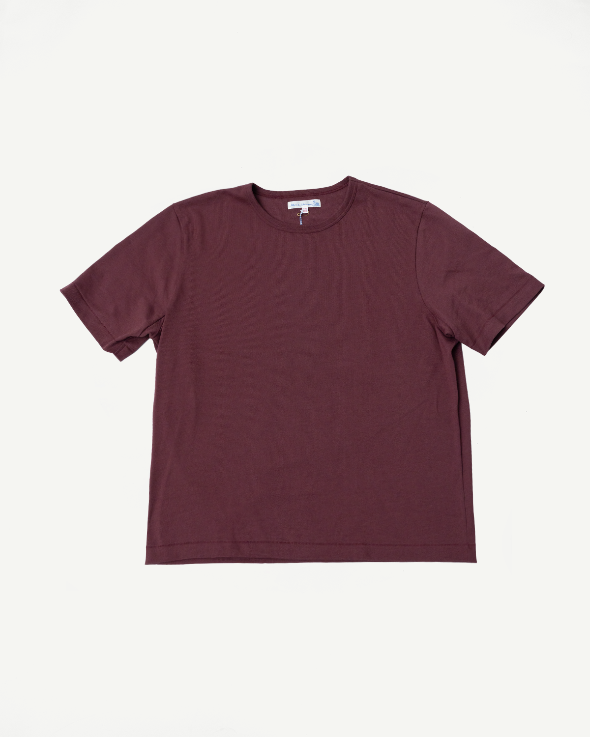Front view flat lay of a burgundy short-sleeve t-shirt with a crew neck.
