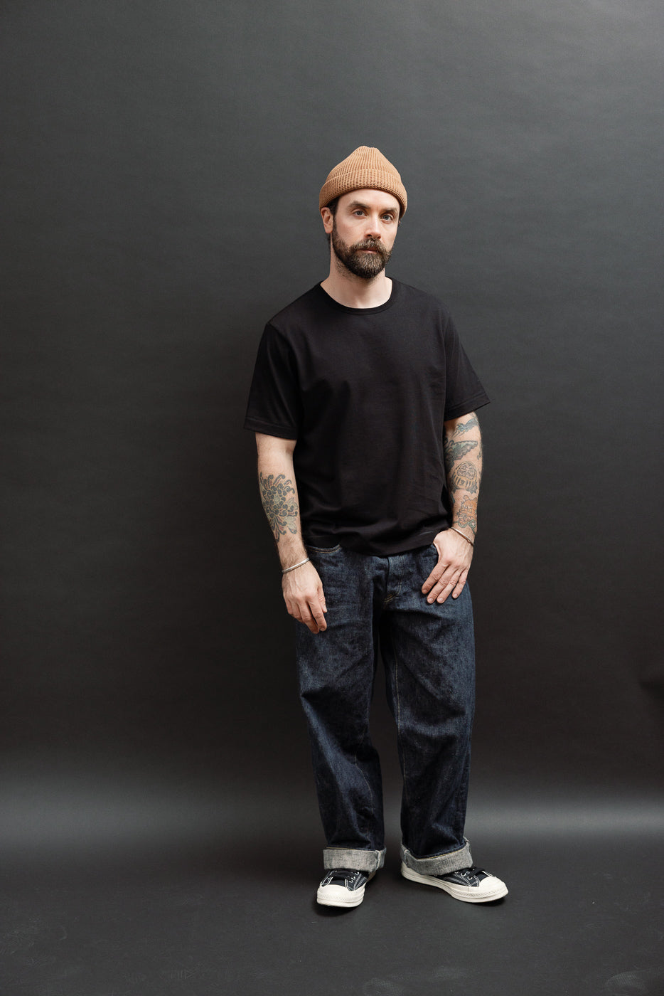 Full body front view of a male model, 5'9