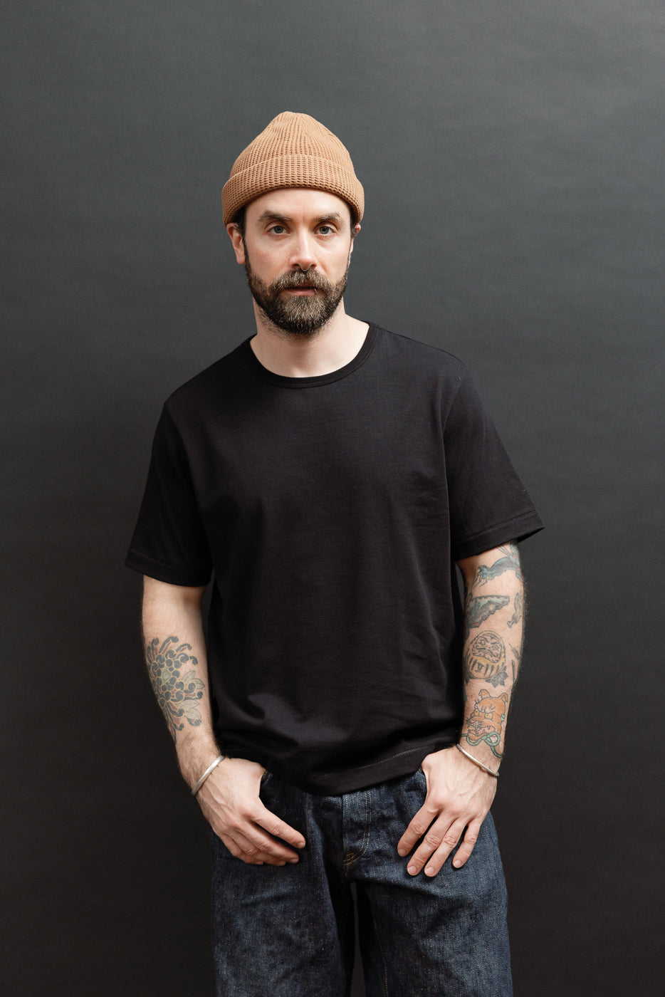 Full body front view of a male model, 5'9