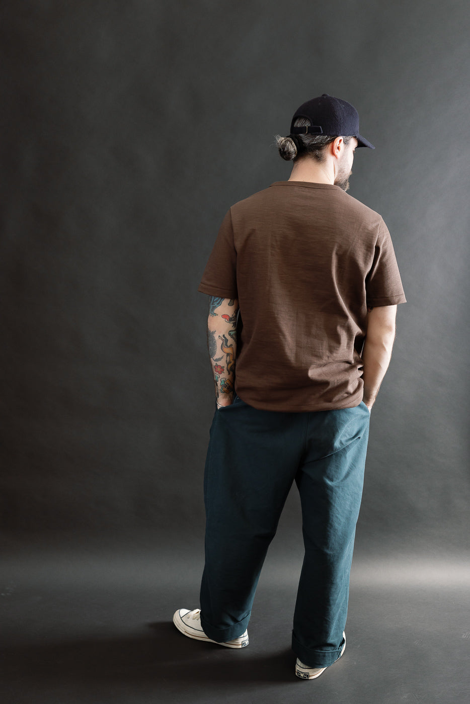 Full body back view of male model 5'9