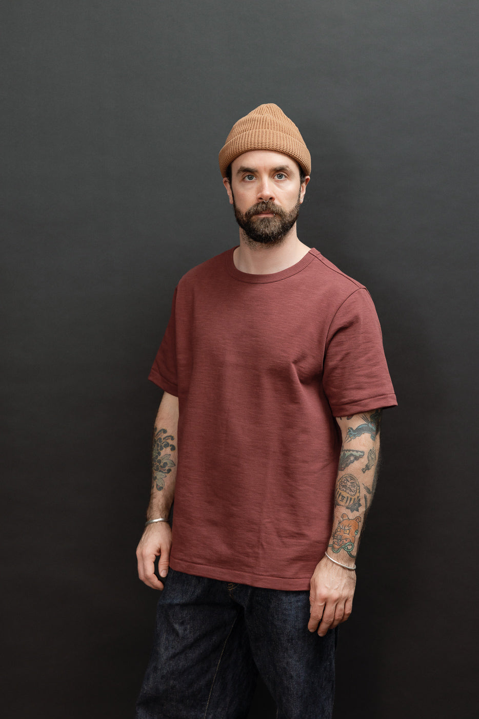 Full body front view of a male model, 5'9