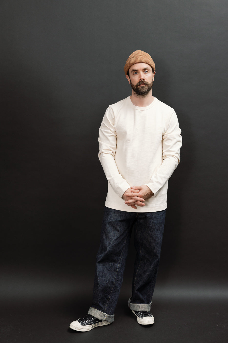 Full body front view of a male model, 5'9