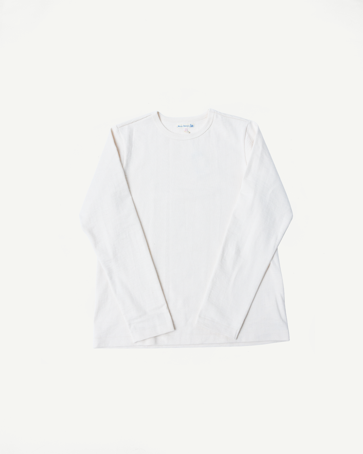 Front view flat lay of a white long-sleeve crewneck t-shirt.