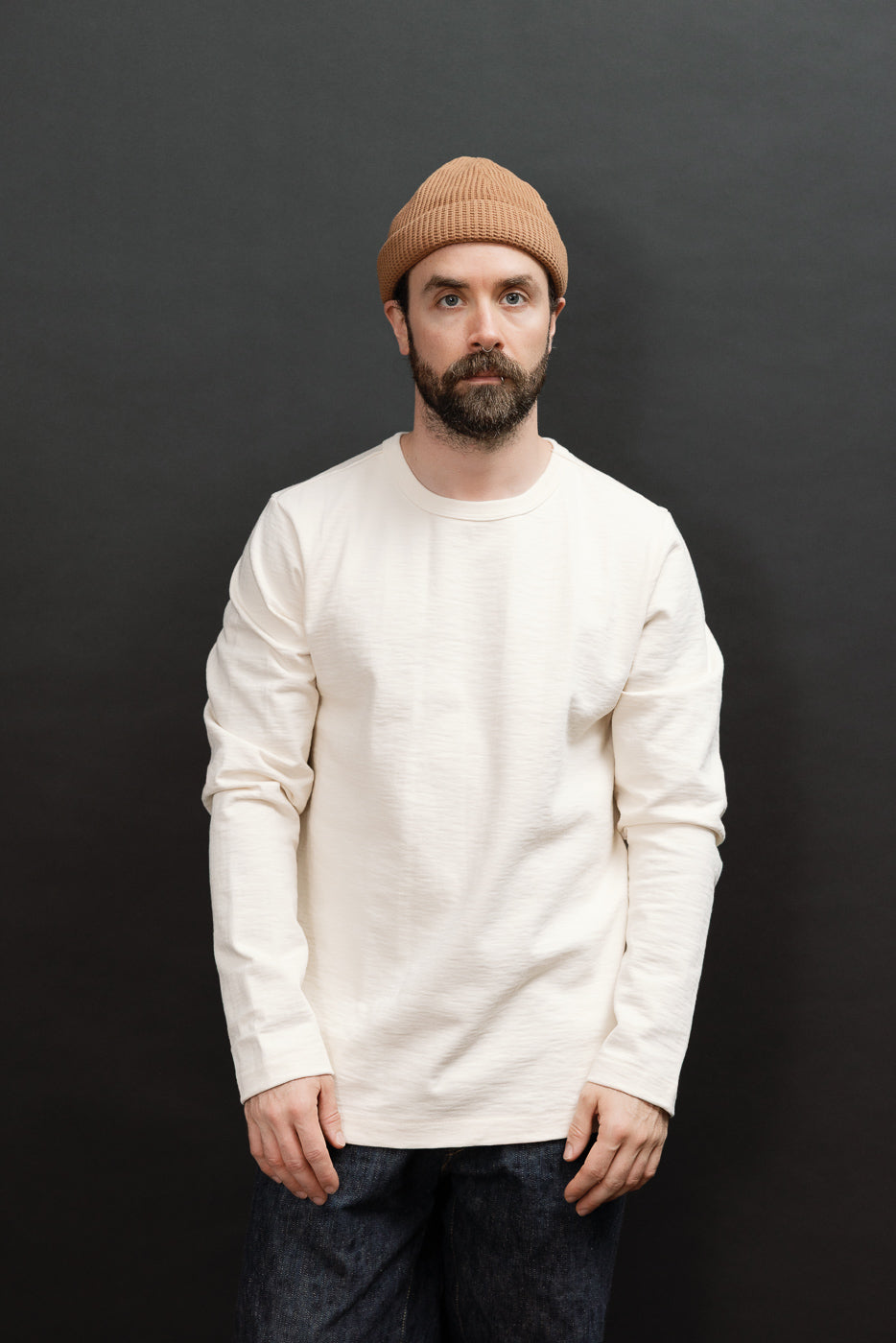 Front view, full body of a male model (5'9