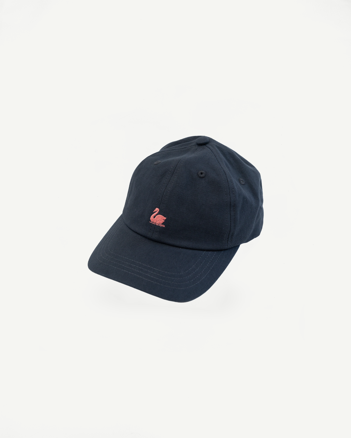 Front angled flat lay of charcoal cotton twill cap with rose swan logo embroidery.