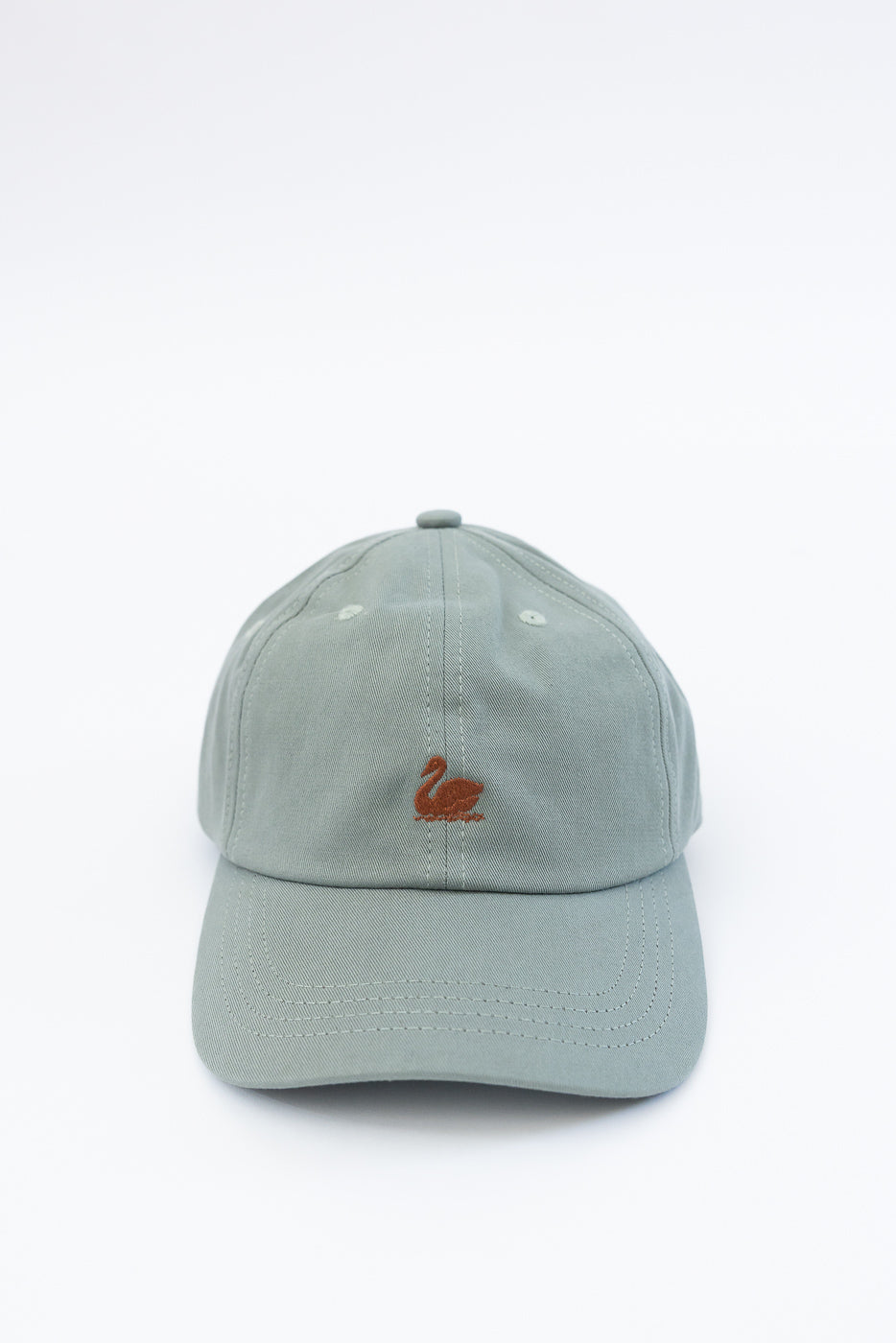 Front close-up of light army cotton twill cap with brown swan logo embroidery.