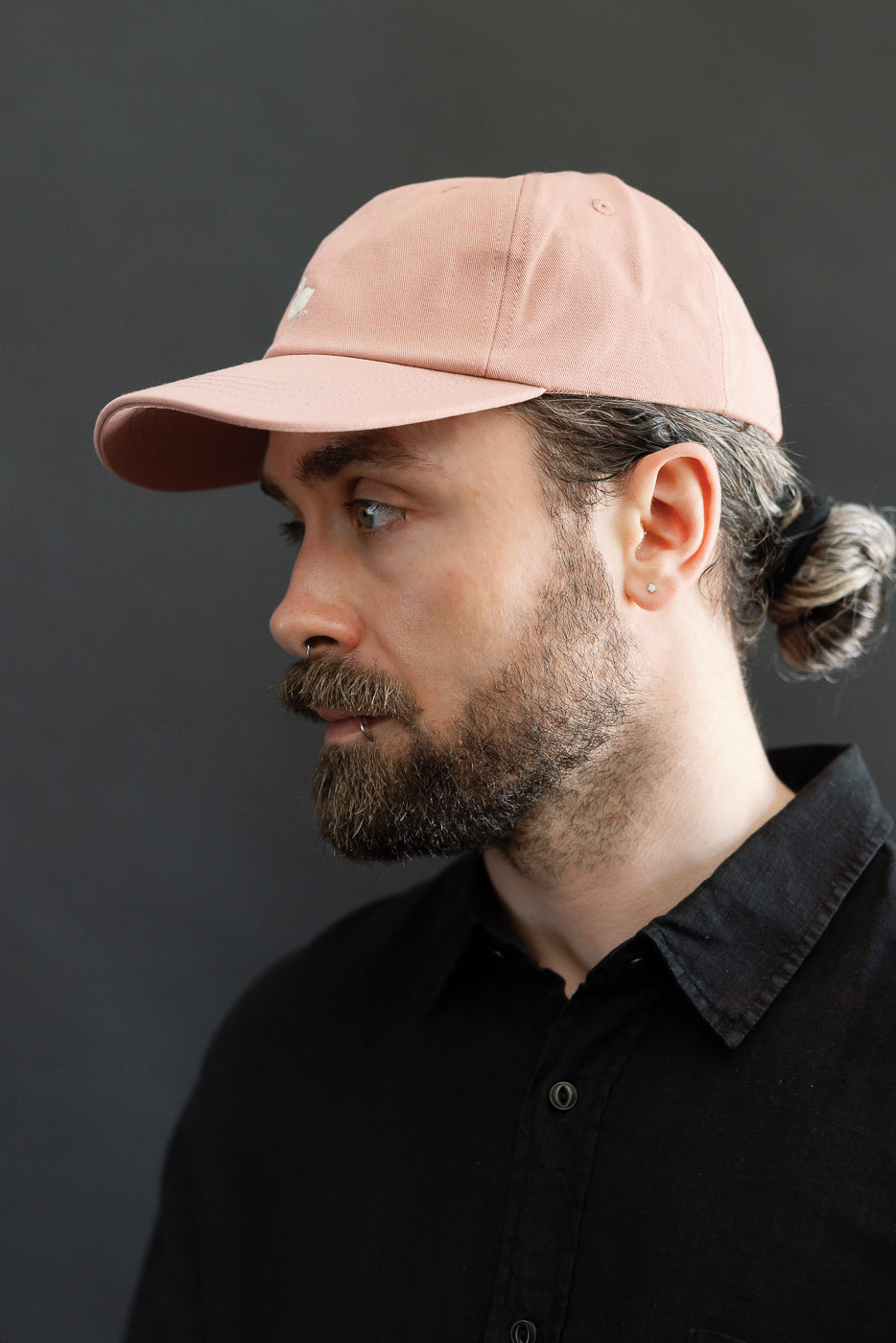 Side profile close-up of male model, 5'9