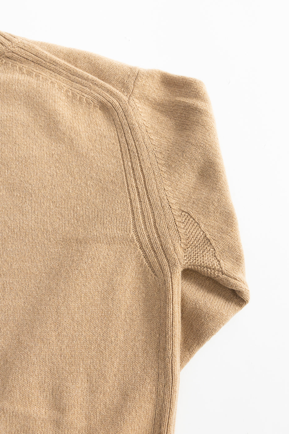 Close-up of toffee recycled cashmere sweater, left shoulder seam and sleeve texture detail