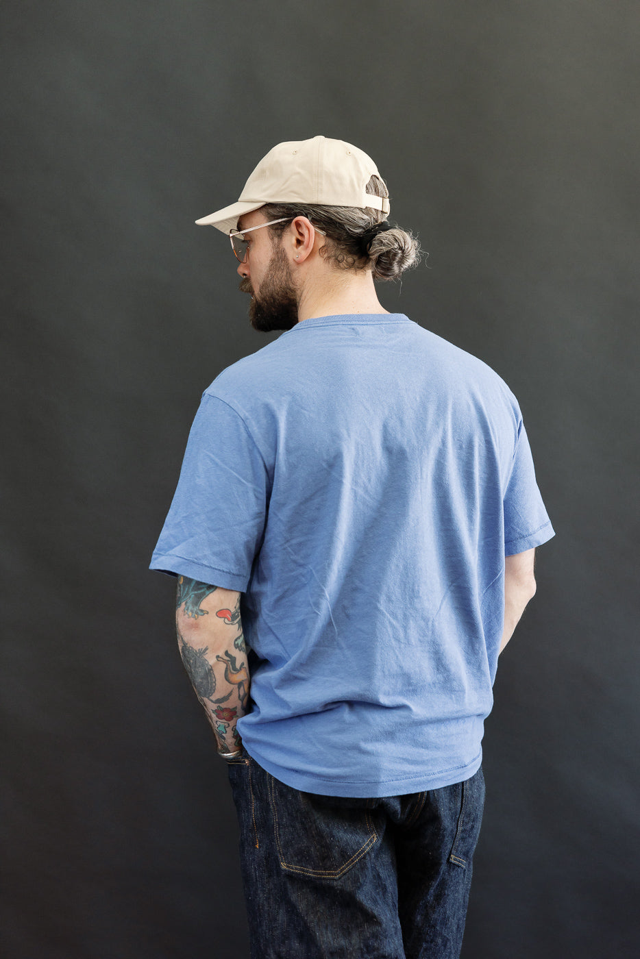 Back view, full-body of athletic male model 5'9