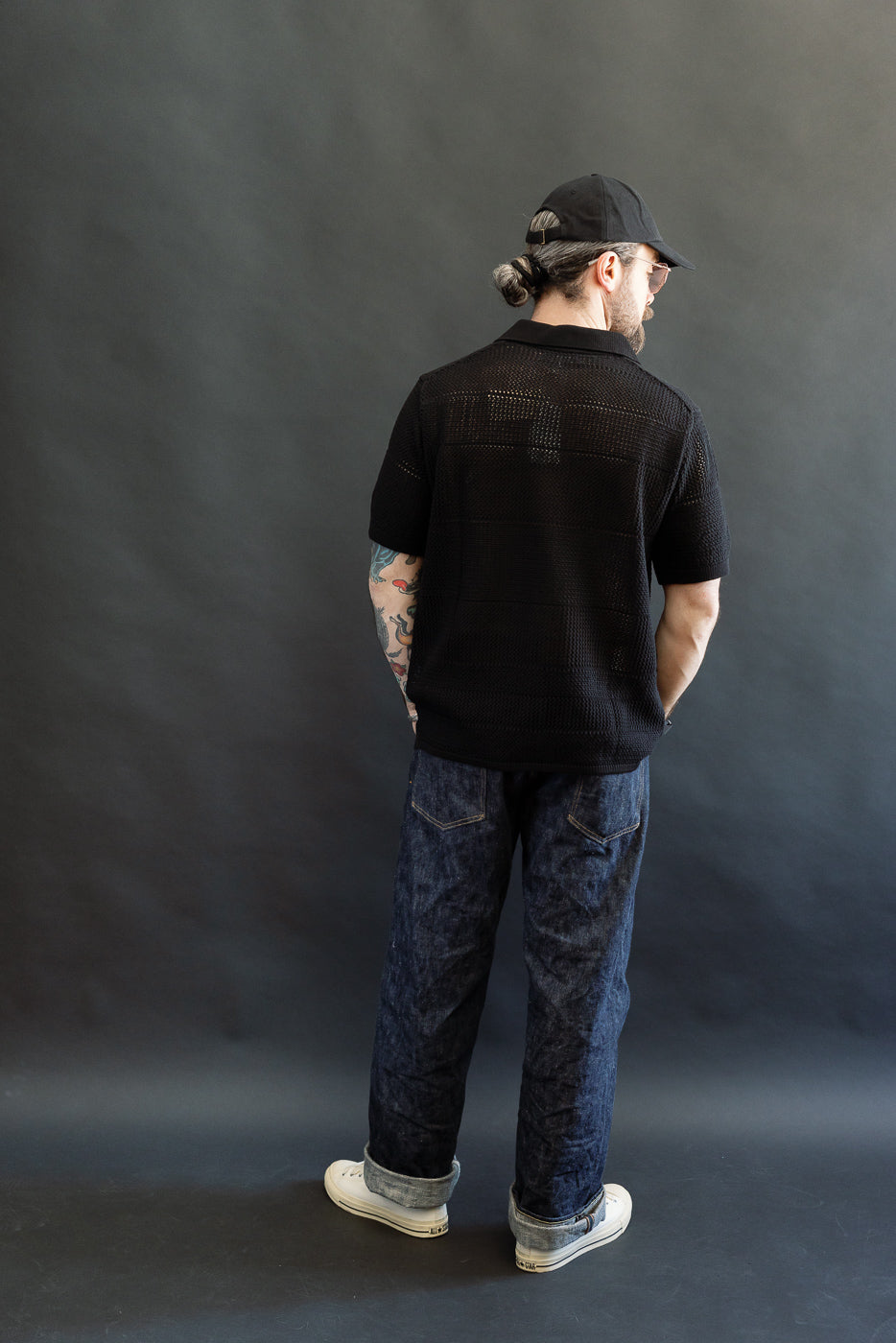 Full body rear view of male model 5'9