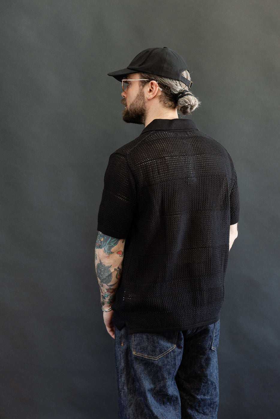 Full body back view of male model 5'9