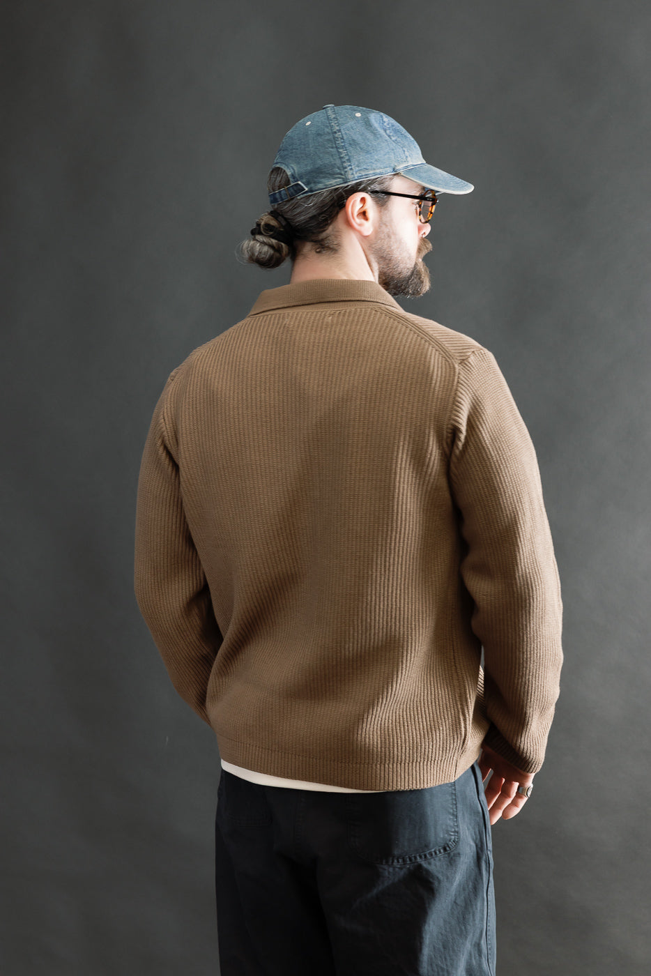 Back view of male model 5'9