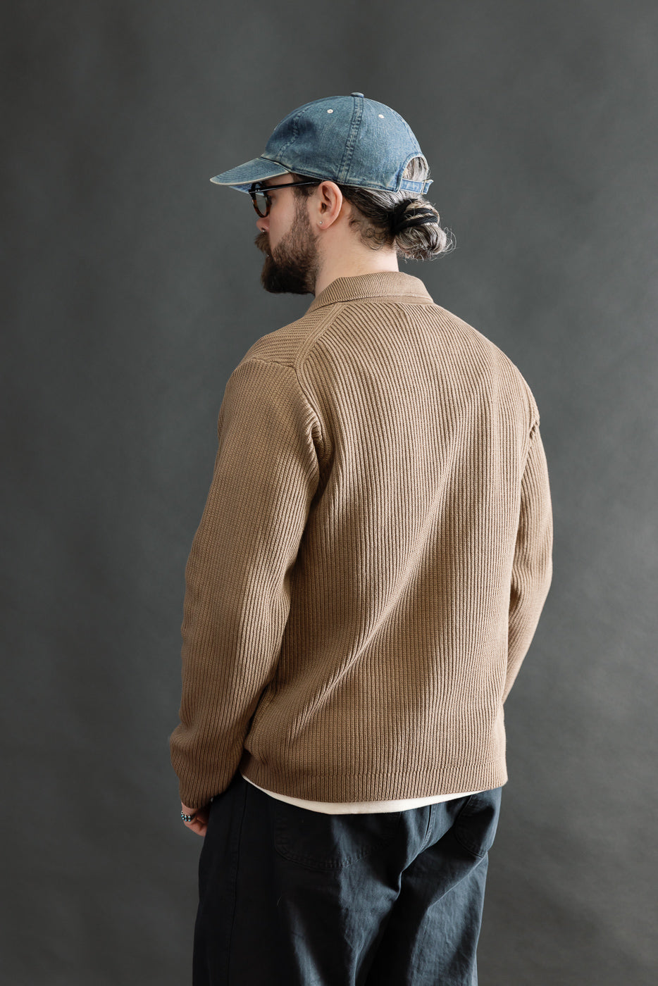 Back view of male model 5'9