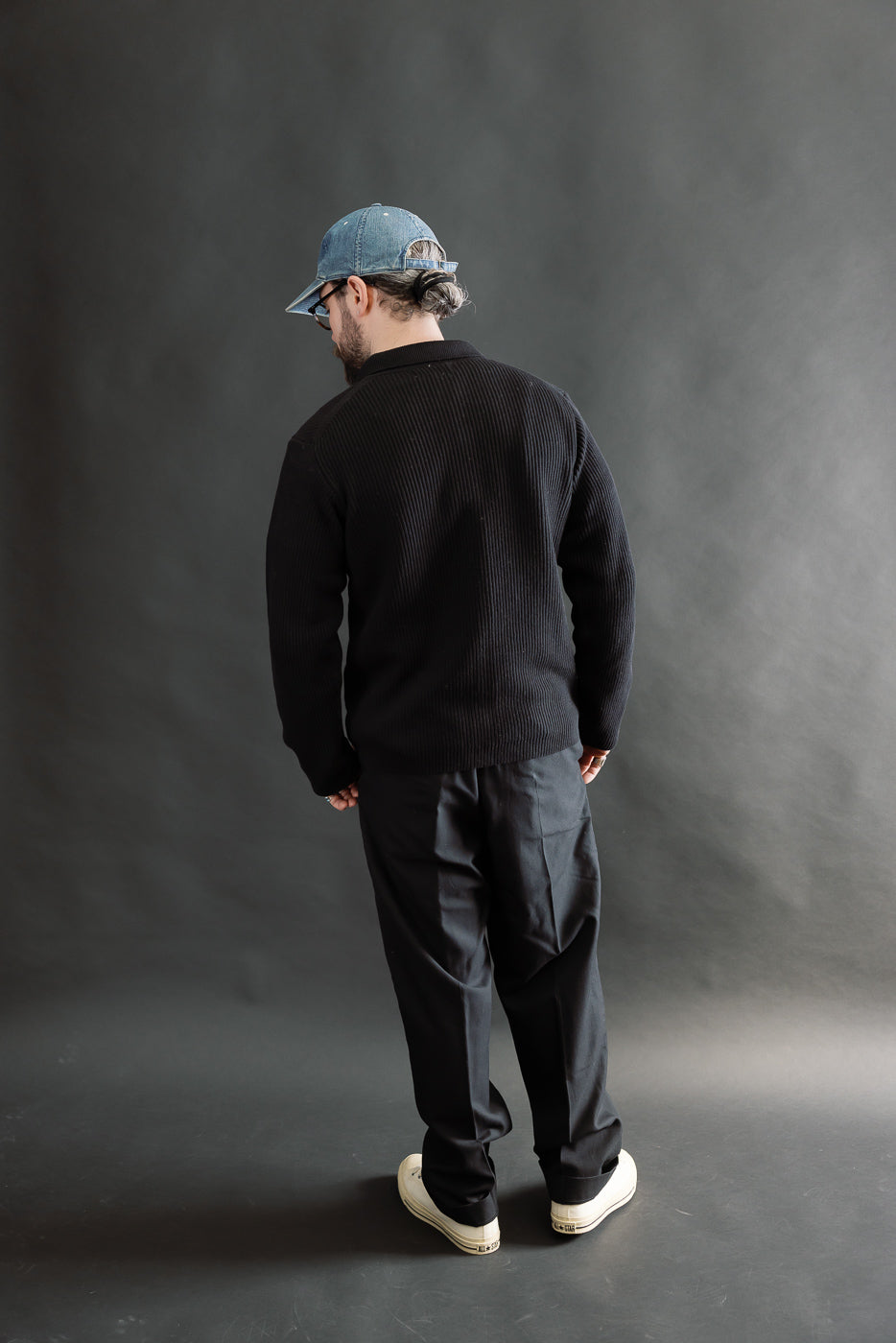 Full body rear view of male model 5'9