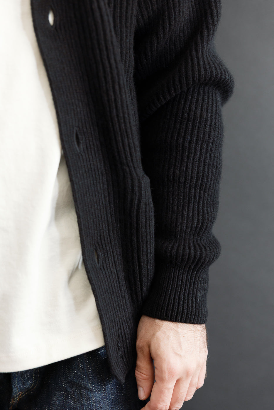 Close-up side view of a male model (5'9