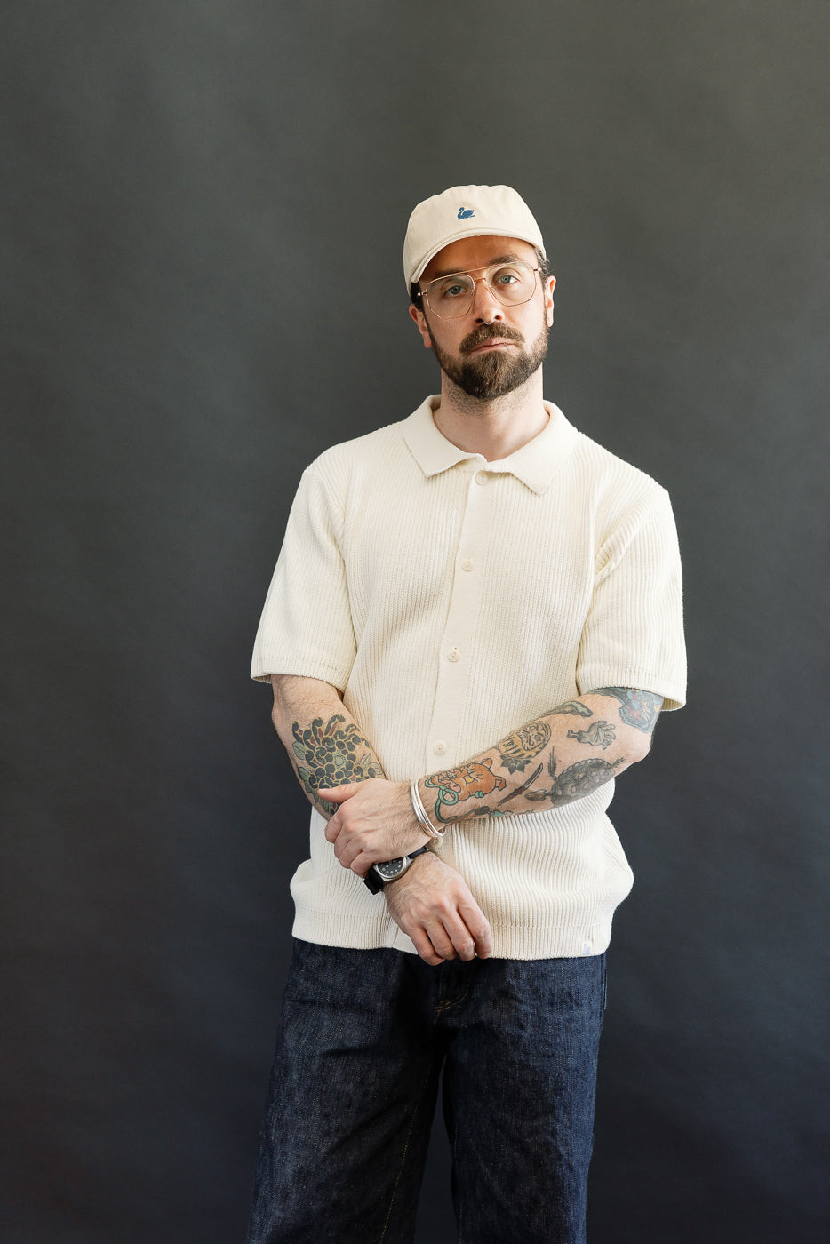 Front view, mid-shot of a male model 5'9