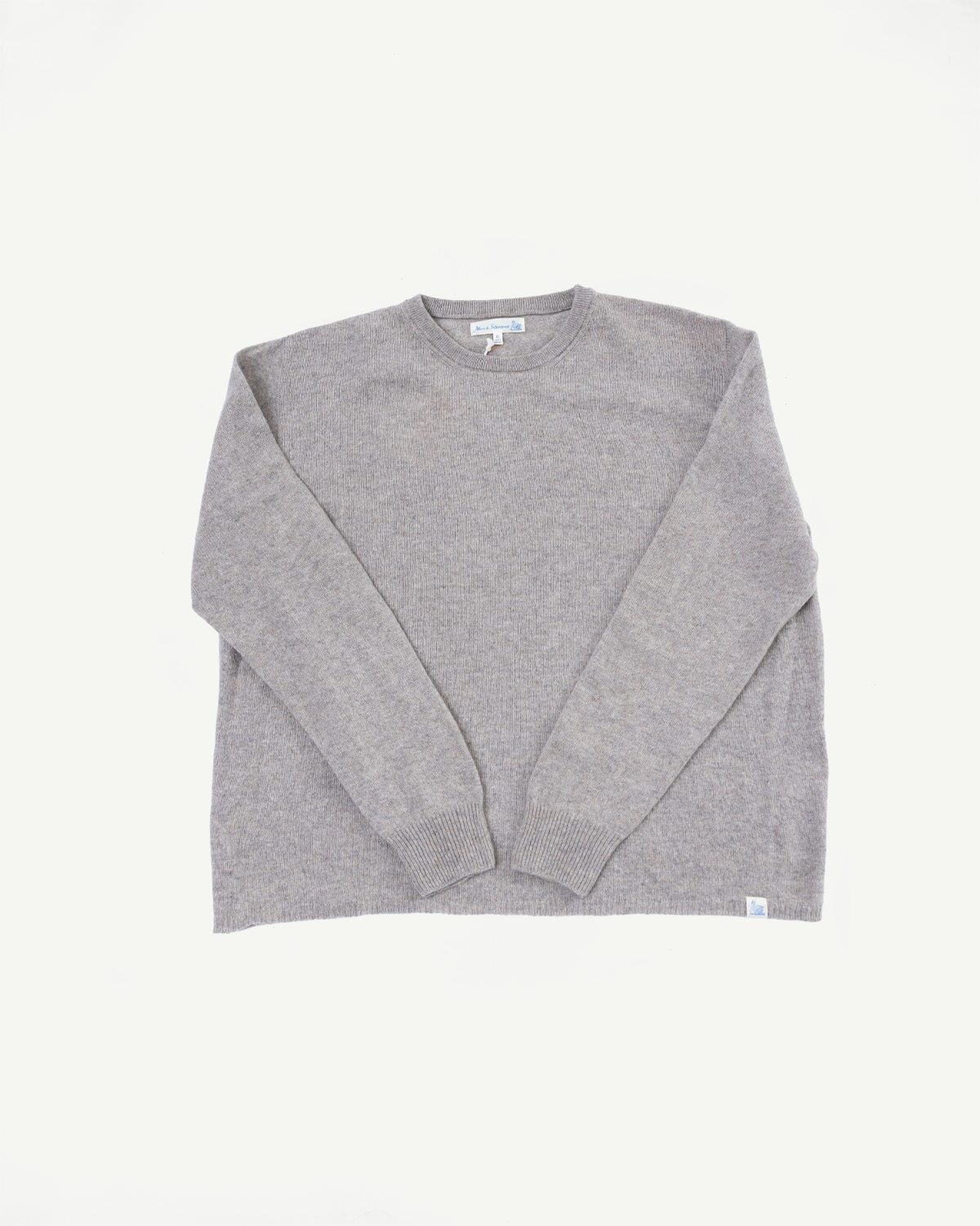 Front view flat lay of a light grey crewneck sweater showing the full garment.
