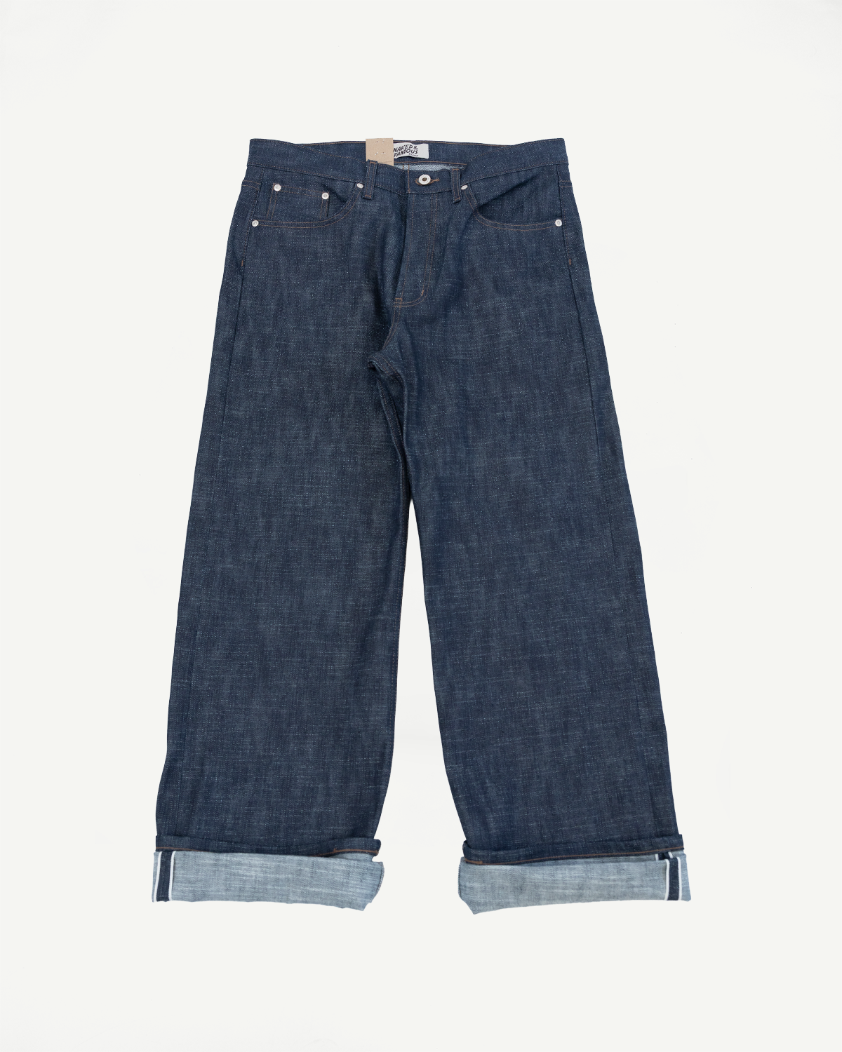 12.5oz Greencast Stretch Selvedge - Strong Guy jeans with classic five-pocket design, rolled cuffs revealing selvedge, button fly, and waxed leather patch, showcasing Japanese denim craftsmanship against a white background.