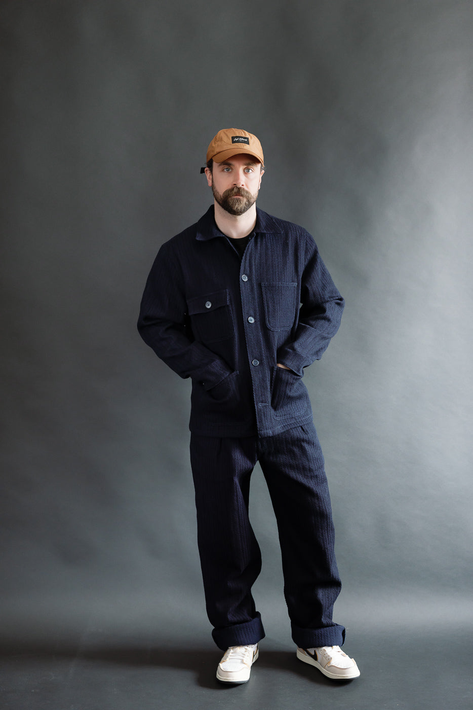 Full body front view of male model 5'9