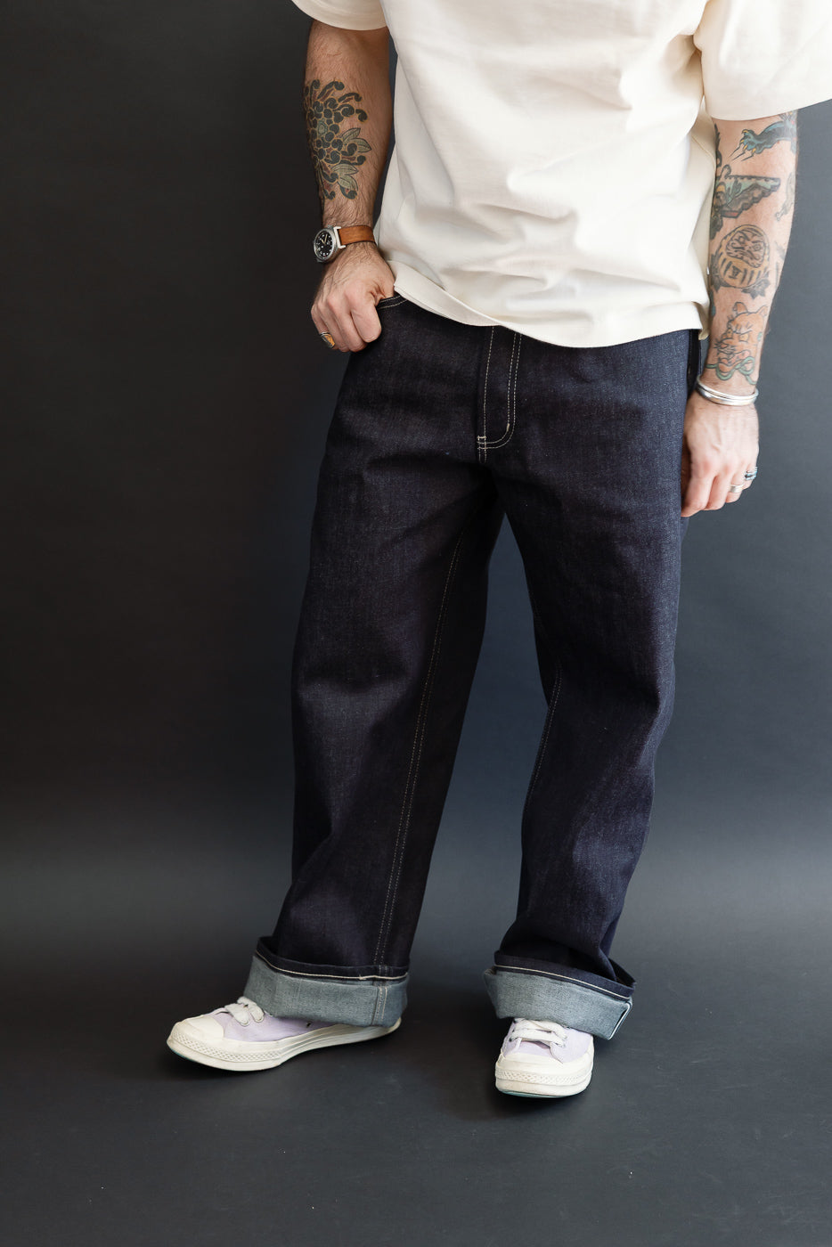 Full body front view of a male model, 5'9