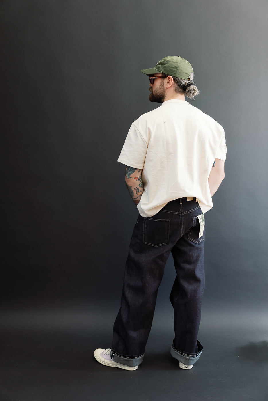 Full body back view of a male model (5'9