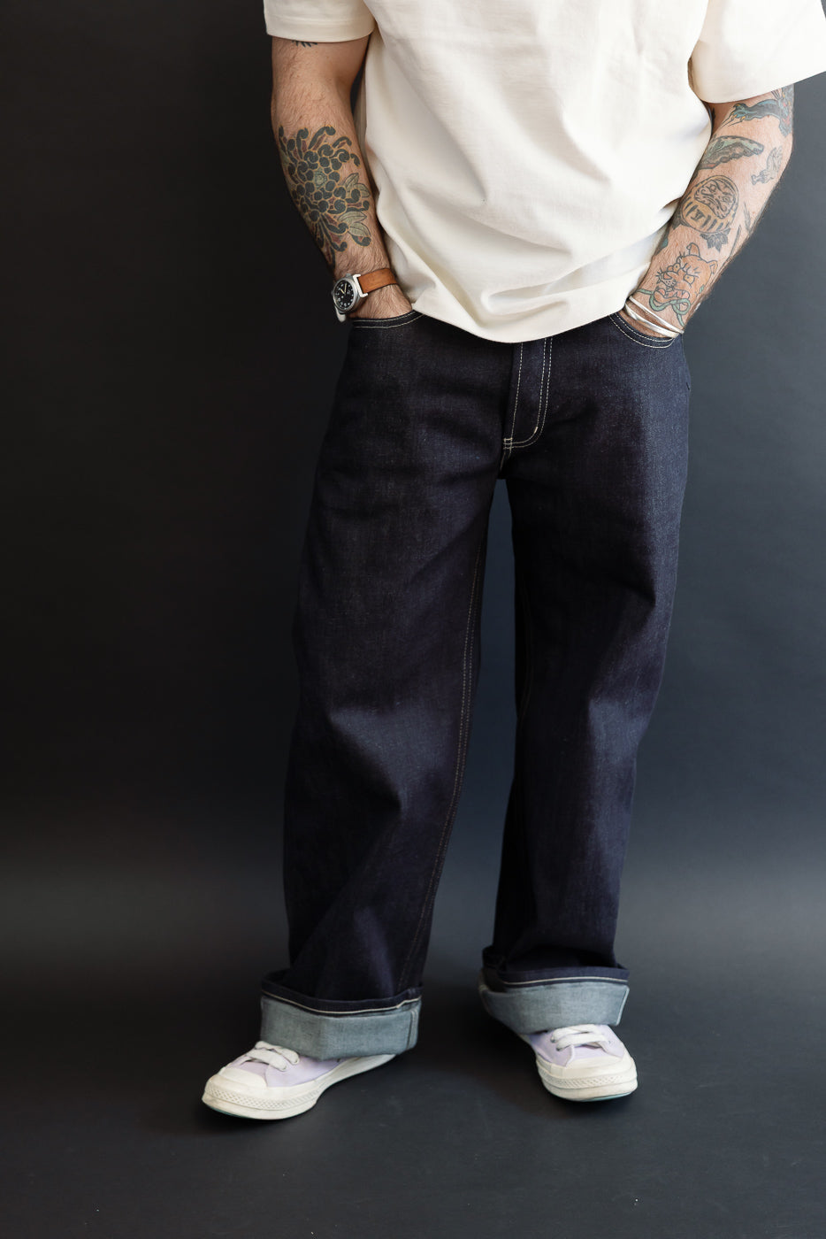 Full body front view of a male model, 5'9